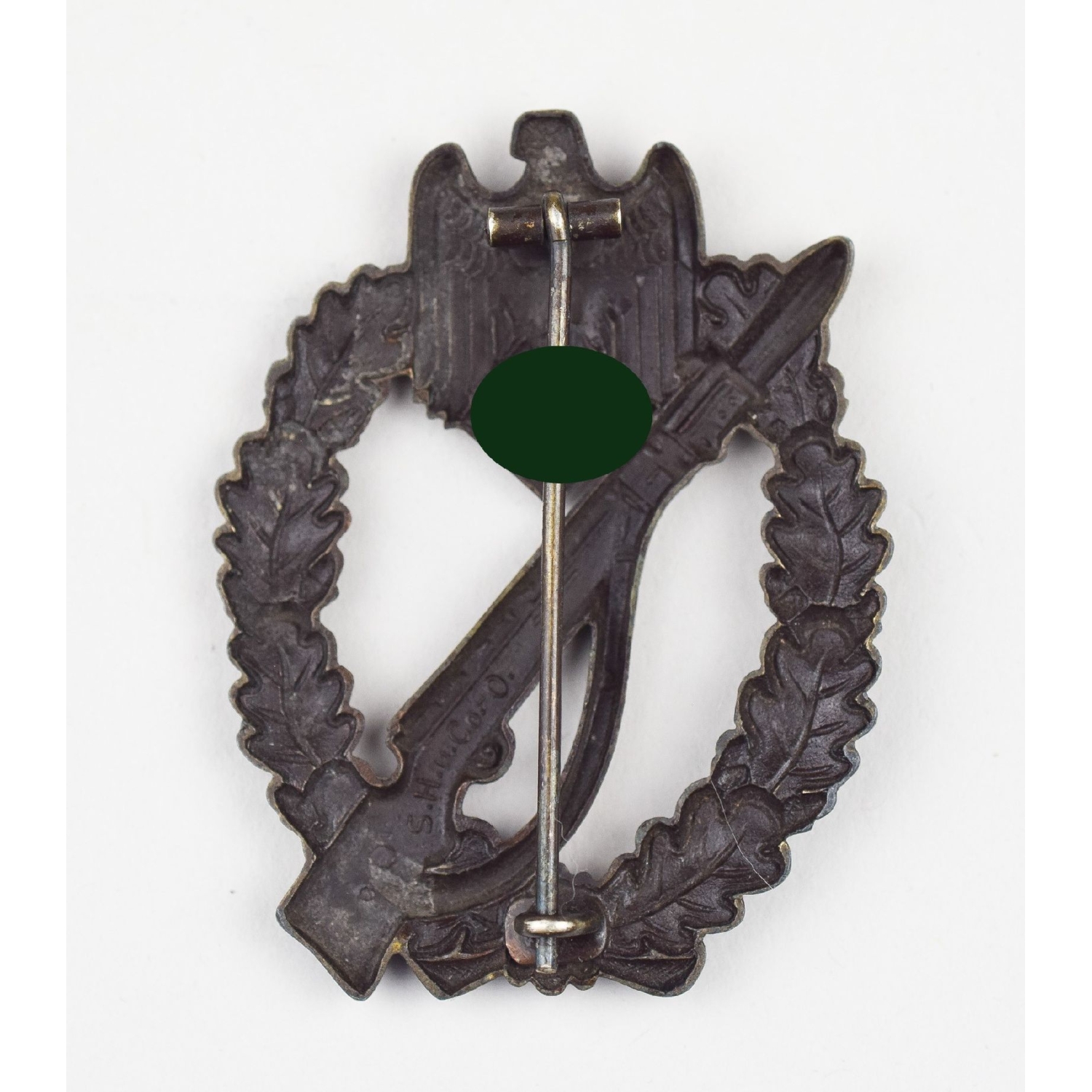 Infanterie Sturmabzeichen in Bronze hohl mit Herst. Markierung "S.H.u.C.o" selten!