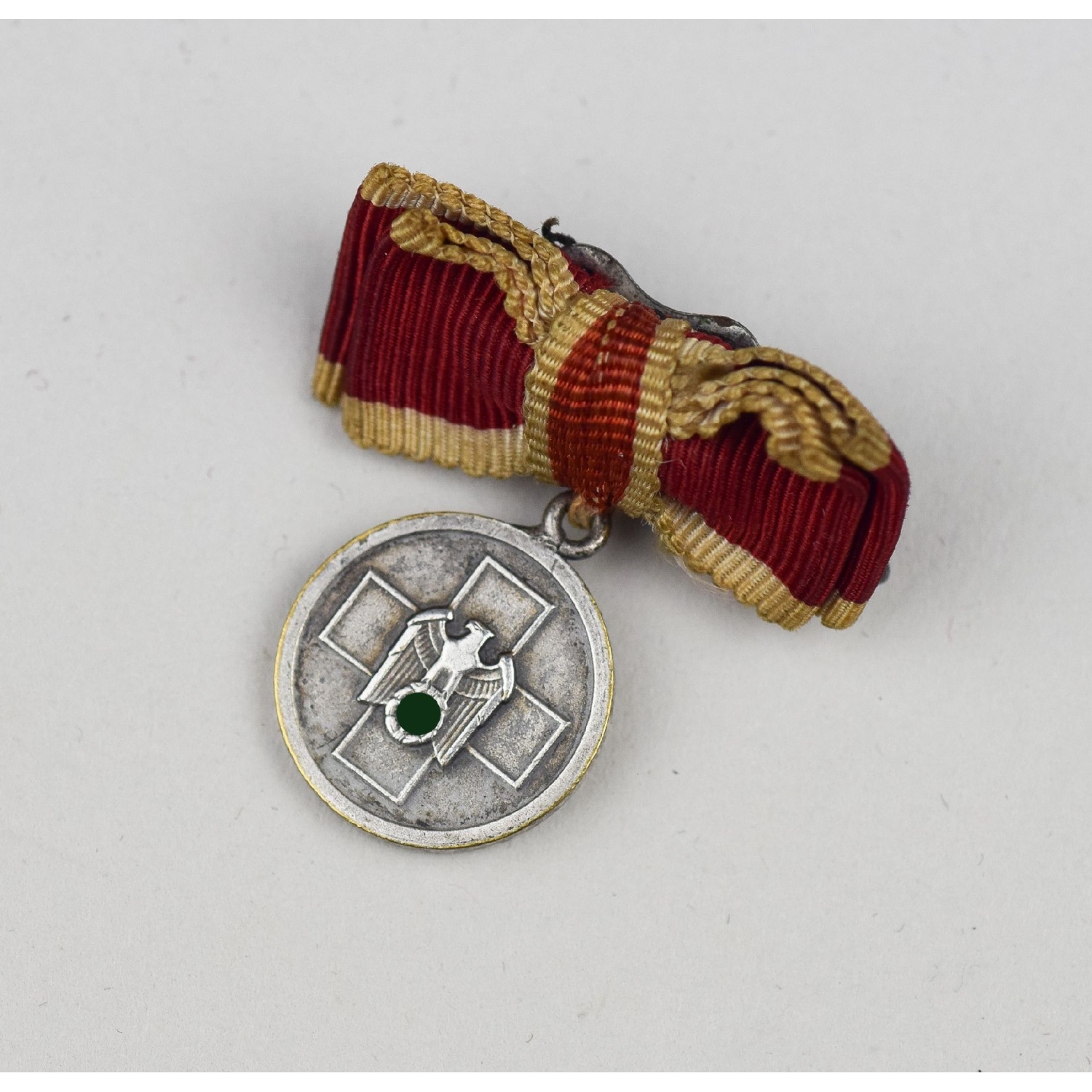 Miniatur Deutsche Volkspflege Medaille am Band an Damenschleife