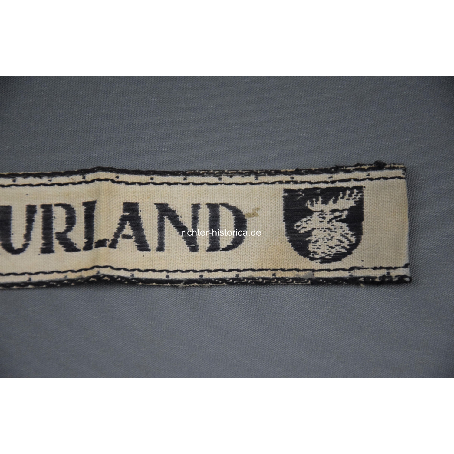 KURLAND Ärmelband