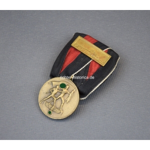 Einzelspange Oktobermedaille Sudetenland mit Prager Burg Auflage