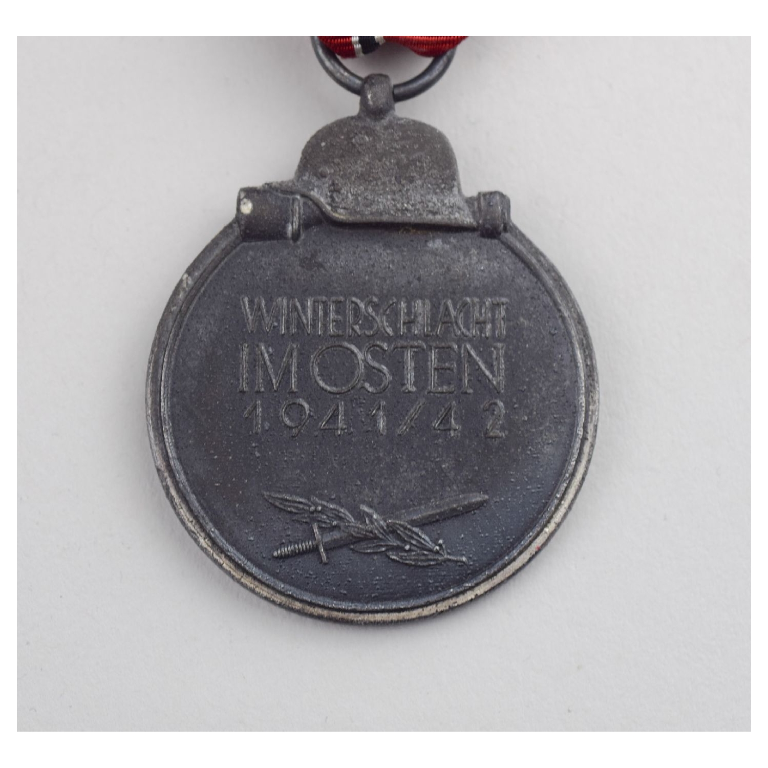 Ostmedaille Winterschlacht im Osten mit Hersteller Markierung "13"