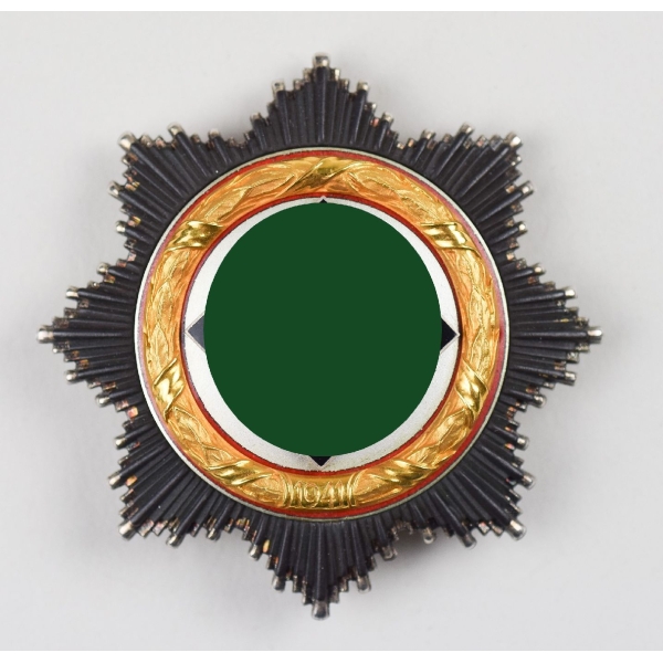 Deutsches Kreuz in Gold Herst.134 Zustand 1 in Mint!