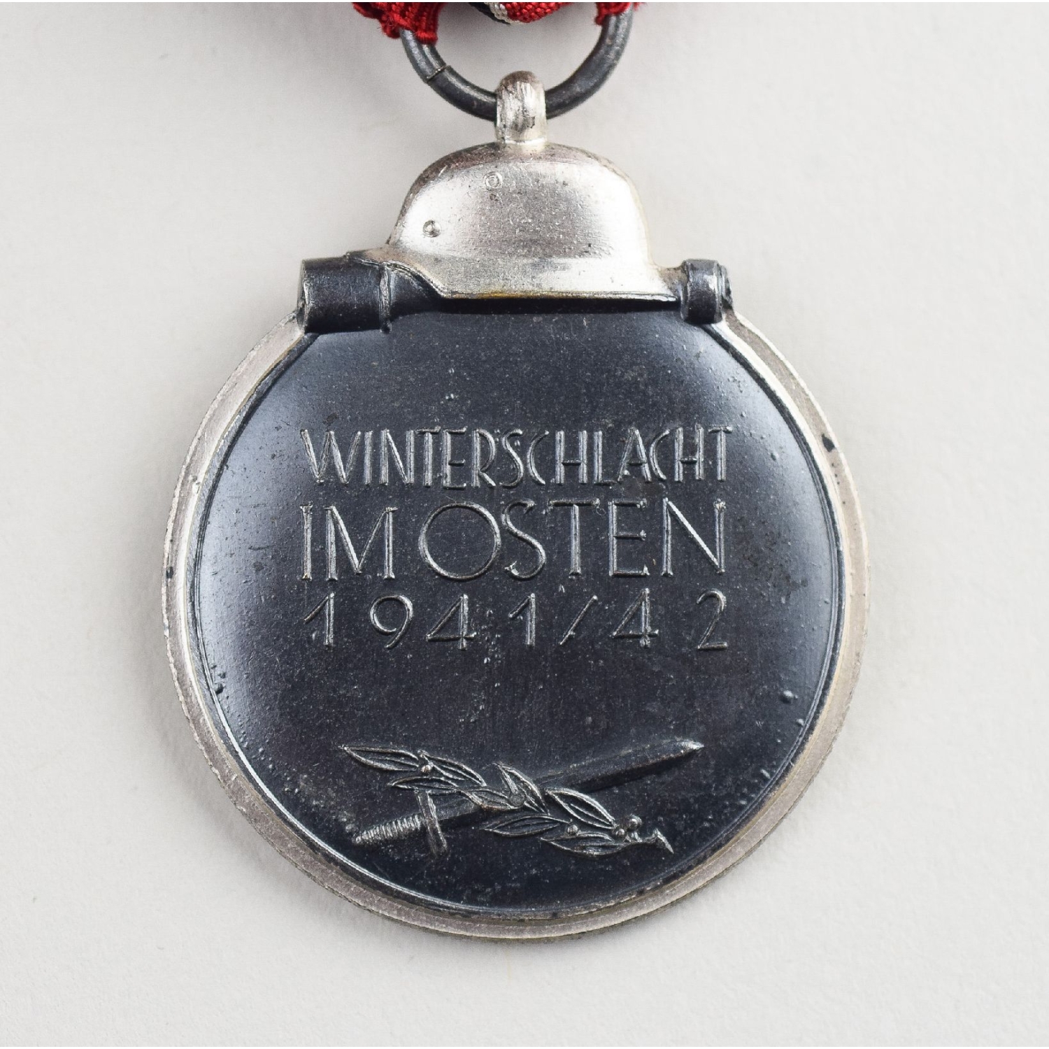 Winterschlacht im Osten Ostmedaille 1941/42 mit Herst. 65 Zustand 1