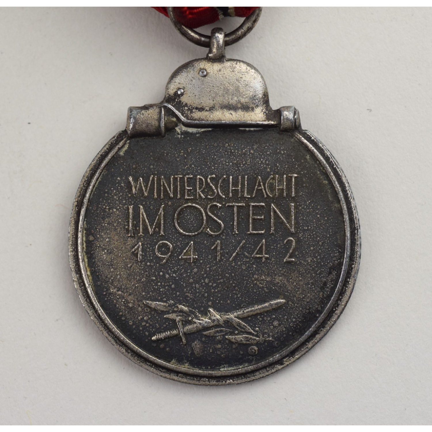 Winterschlacht Im Osten Medaille mit Herst. "19" am Band